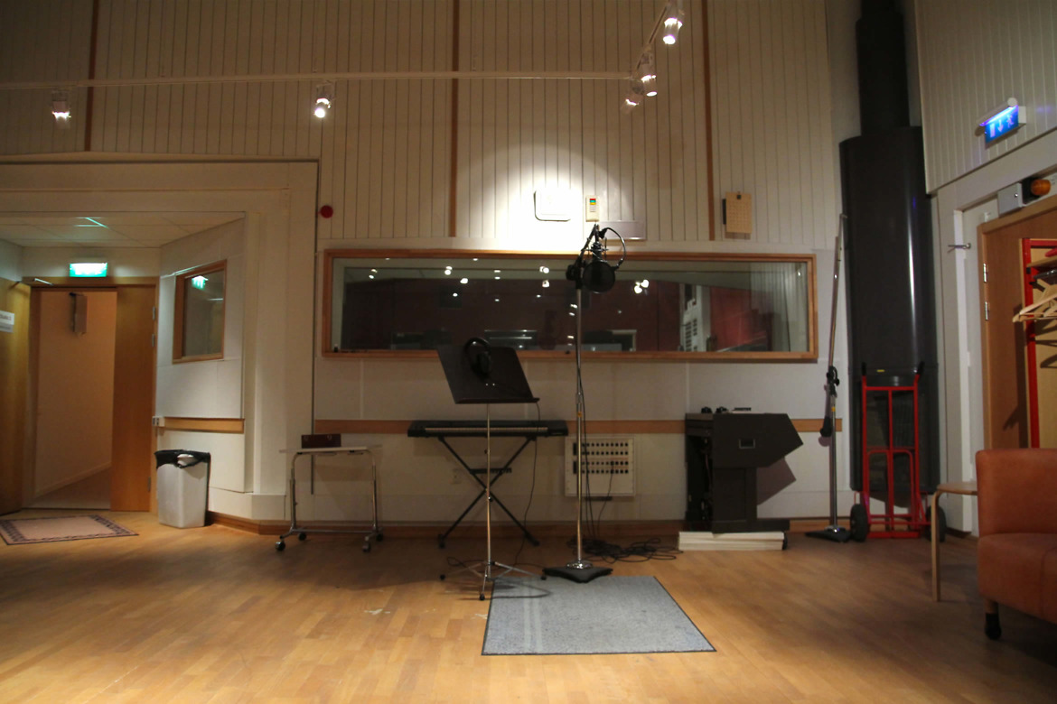 Studio för sånginspelning bra kommunikation i musikstudio mellan sångare och ljudtekniker